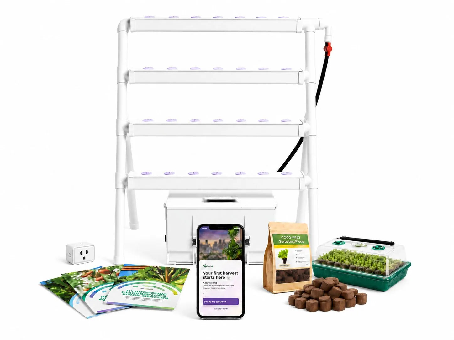 Everything included with Homie Smart laid out together: the legs and four channels, the reservoir, the smart plug, the Vegardi app on a phone, a bag of coco-peat sprouting plugs, a propagator tray and the guide booklets.