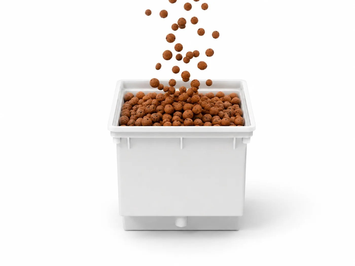 Clay pebble growing media pouring into a white Dutch Bucket.
